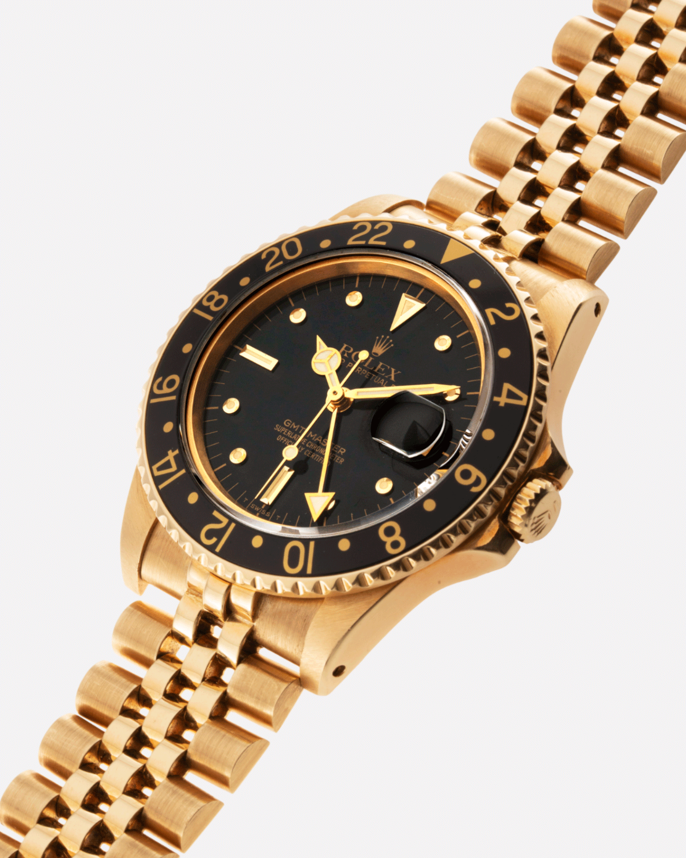 Brand: Rolex Year: 1985 Model: GMT-Master Reference Number: 1675 Serial Number: 8.7 mil Material: 18k Yellow Gold Movement: Cal. 1570 Case Diameter: 40mm Lug Width: 20mm Strap: 18k Yellow Gold Rolex 8386 Jubilee Bracelet with ’47’ End Links