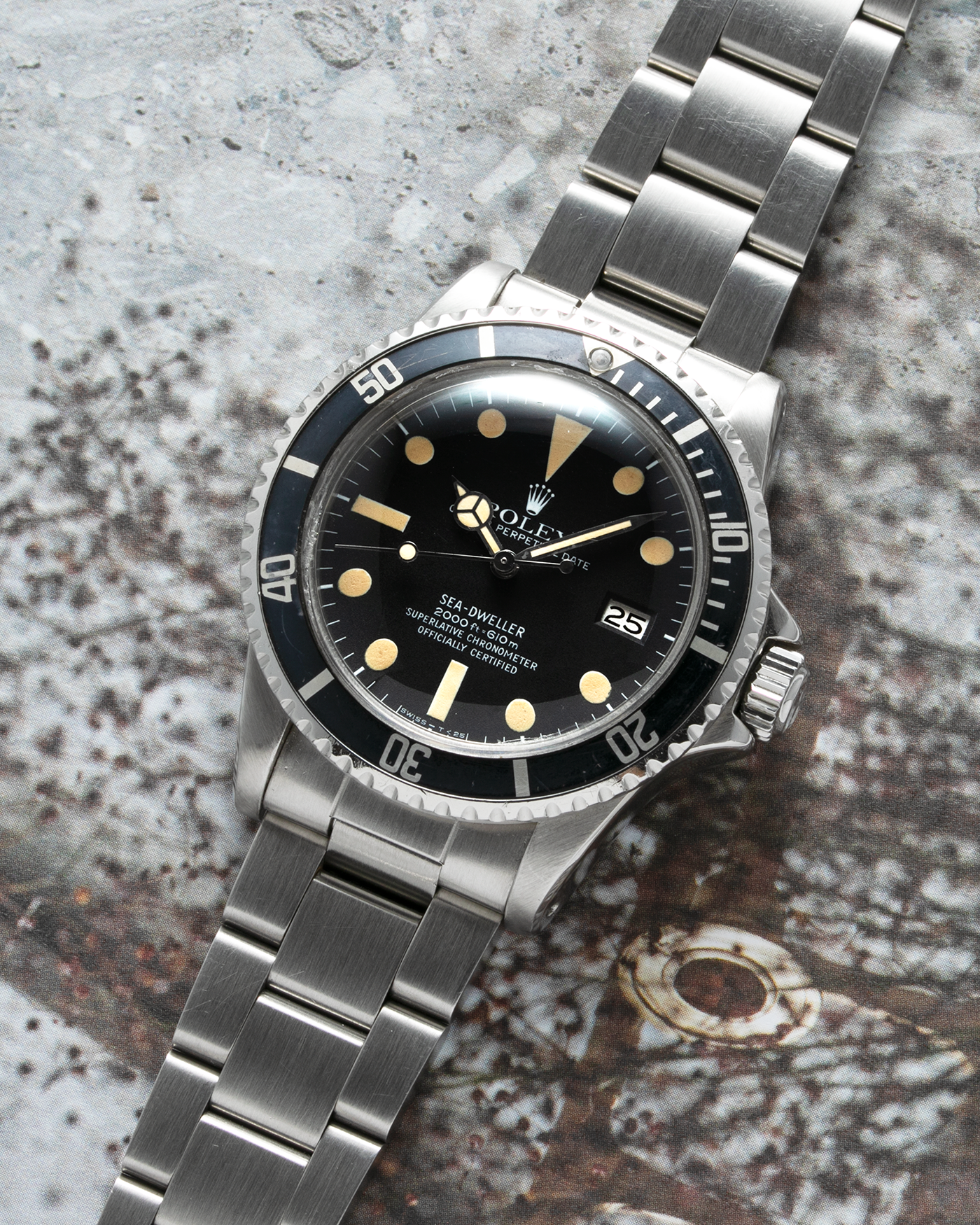 Brand: Rolex Year: 1978 Model: Sea Dweller Reference Number: 1665 Serial Number: 5.4 mil Material: Stainless Steel Movement: Cal. 1570 Case Diameter: 40mm Lug Width: 20mm Bracelet/Strap: Rolex 93150 Bracelet with 593 End Links