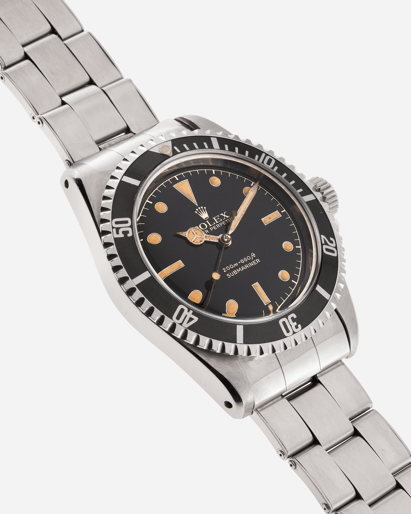 Brand: Rolex Model: Submariner Reference Number: 5512 Serial Number: 69XXXX Year: 1961 Material: Stainless Steel Movement: Cal. 1530 Case Diameter: 40mm Lug Width: 20mm Bracelet/Strap: Stainless Steel Rolex C&I Bracelet Stamped 74
