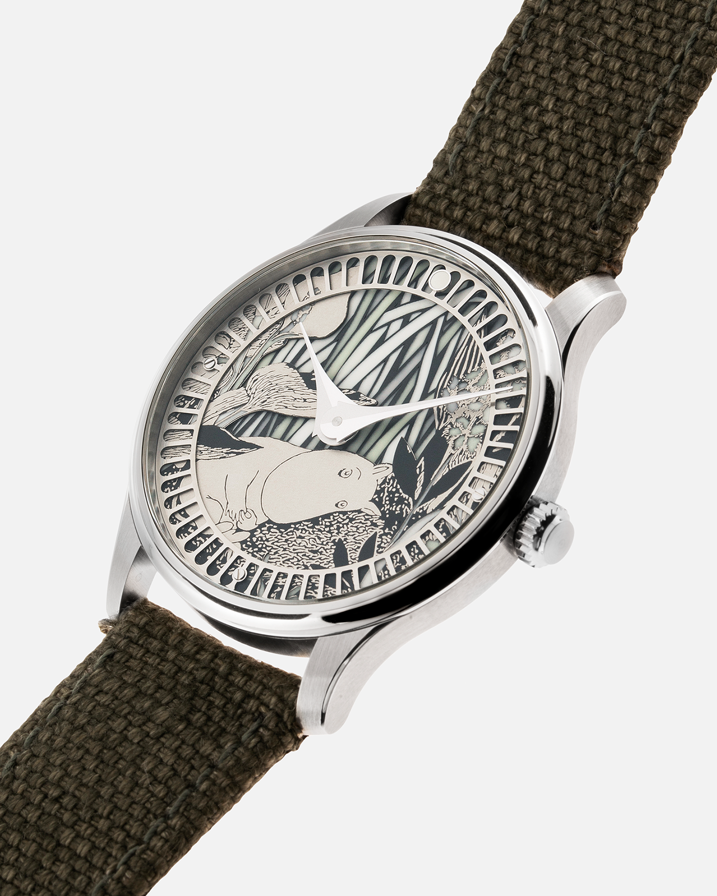 Brand: Sarpaneva S.U.F. Year: 2020 Model: Moomin Material: Stainless Steel Movement: Soprod A10 Case Diameter: 38.7mm Bracelet/Strap: Sarpaneva S.U.F. Green Textile Strap