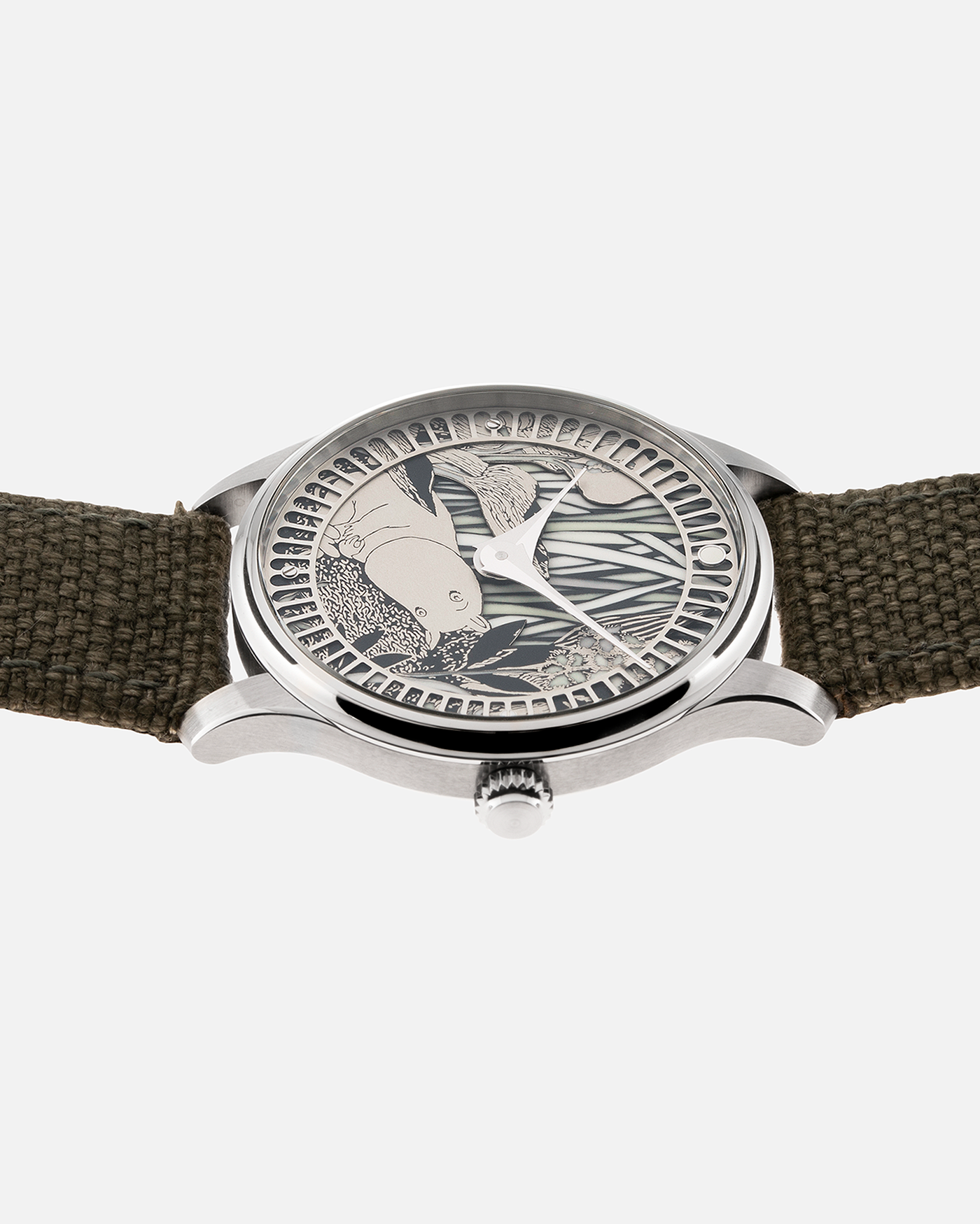 Brand: Sarpaneva S.U.F. Year: 2020 Model: Moomin Material: Stainless Steel Movement: Soprod A10 Case Diameter: 38.7mm Bracelet/Strap: Sarpaneva S.U.F. Green Textile Strap