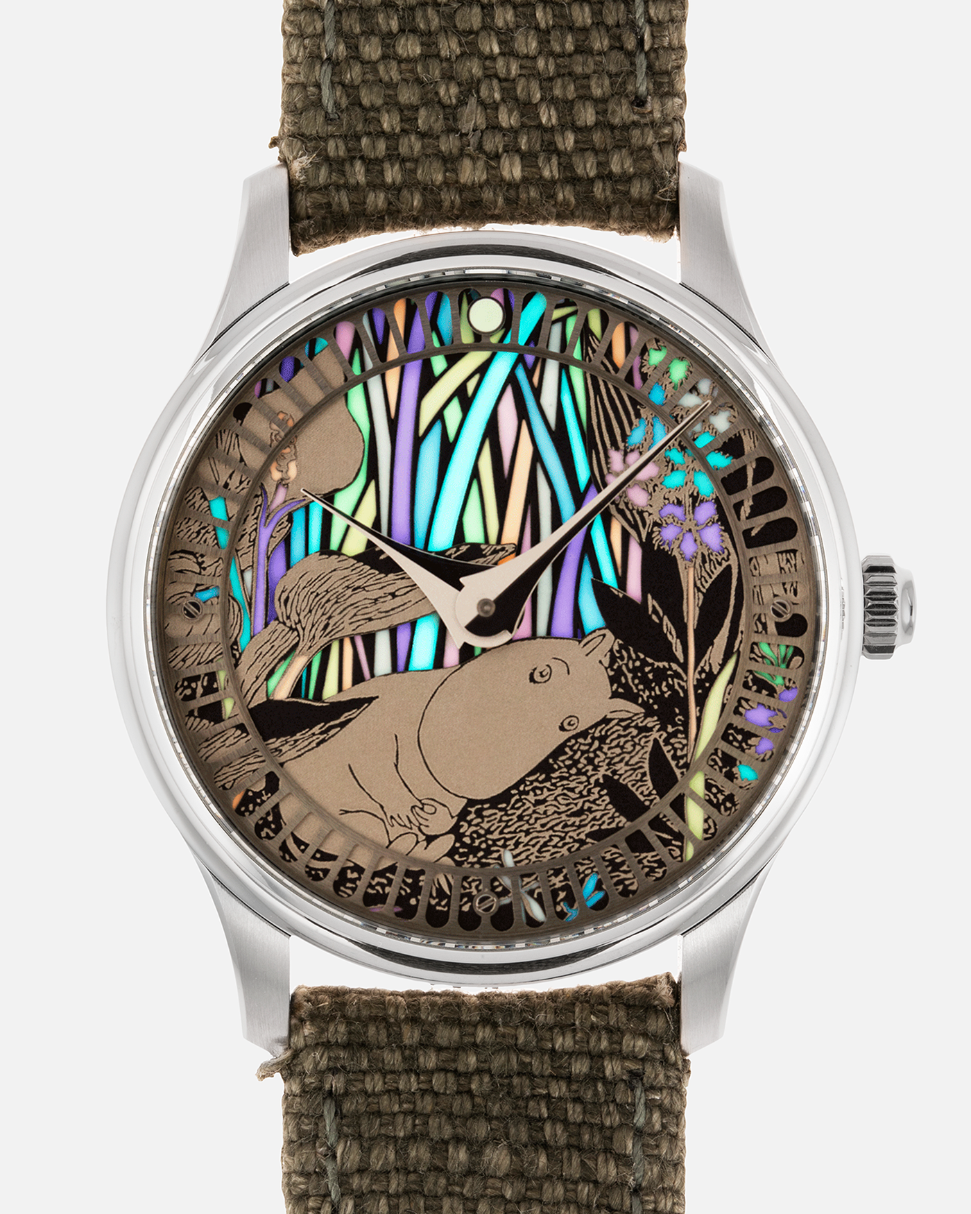 Brand: Sarpaneva S.U.F. Year: 2020 Model: Moomin Material: Stainless Steel Movement: Soprod A10 Case Diameter: 38.7mm Bracelet/Strap: Sarpaneva S.U.F. Green Textile Strap