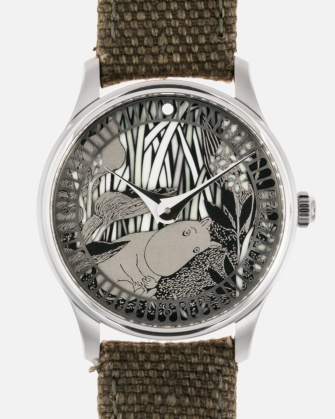Brand: Sarpaneva S.U.F. Year: 2020 Model: Moomin Material: Stainless Steel Movement: Soprod A10 Case Diameter: 38.7mm Bracelet/Strap: Sarpaneva S.U.F. Green Textile Strap