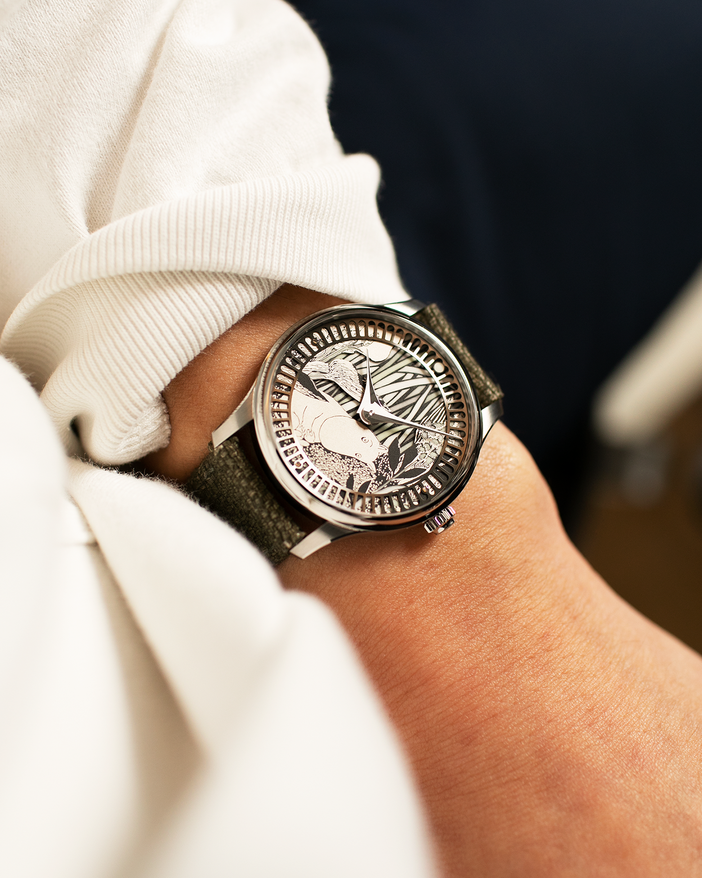 Brand: Sarpaneva S.U.F. Year: 2020 Model: Moomin Material: Stainless Steel Movement: Soprod A10 Case Diameter: 38.7mm Bracelet/Strap: Sarpaneva S.U.F. Green Textile Strap