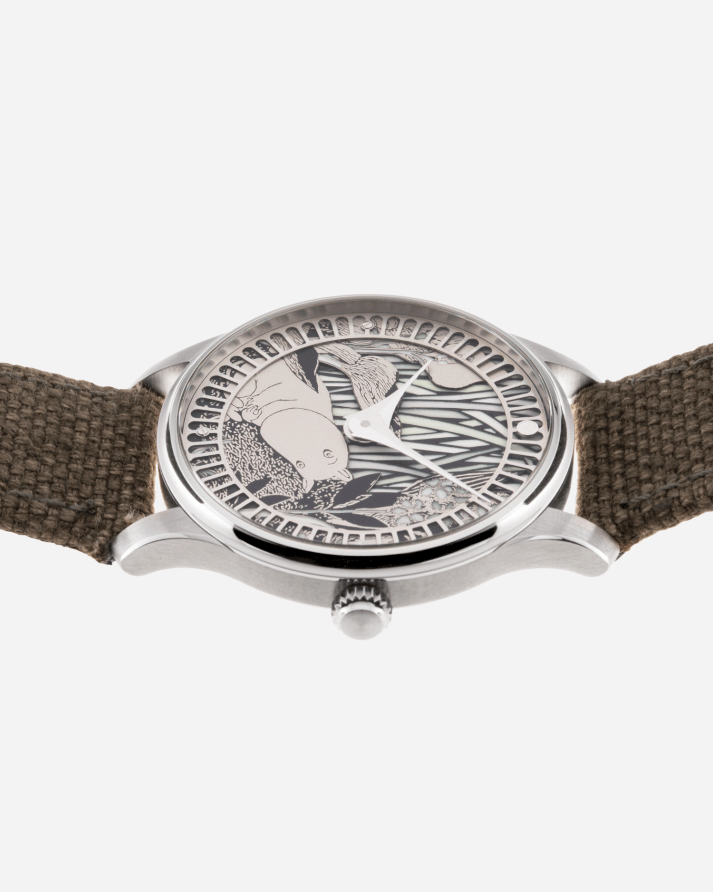 Brand: Sarpaneva S.U.F. Year: 2020 Model: Moomin Material: Stainless Steel Movement: Soprod A10 Case Diameter: 38.7mm Bracelet/Strap: Sarpaneva S.U.F. Green Textile Strap