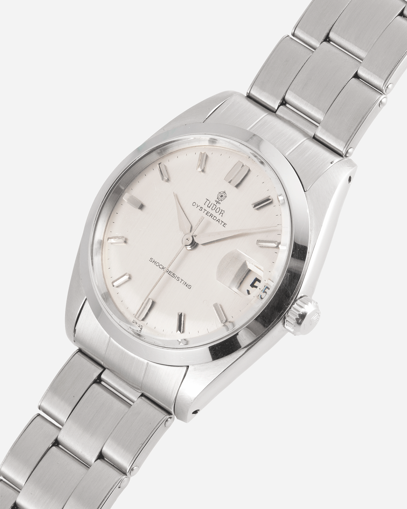 Brand: Tudor Year: 1964 Model: Oysterdate Reference Number: 7962 Serial Number: 447XXX Material: Stainless Steel Movement: Cal. 2403 Case Diameter: 34.5mm Lug Width: 19mm Bracelet/Strap: 19mm Rolex Rivet Bracelet with 57 endlinks, stamped 3.64