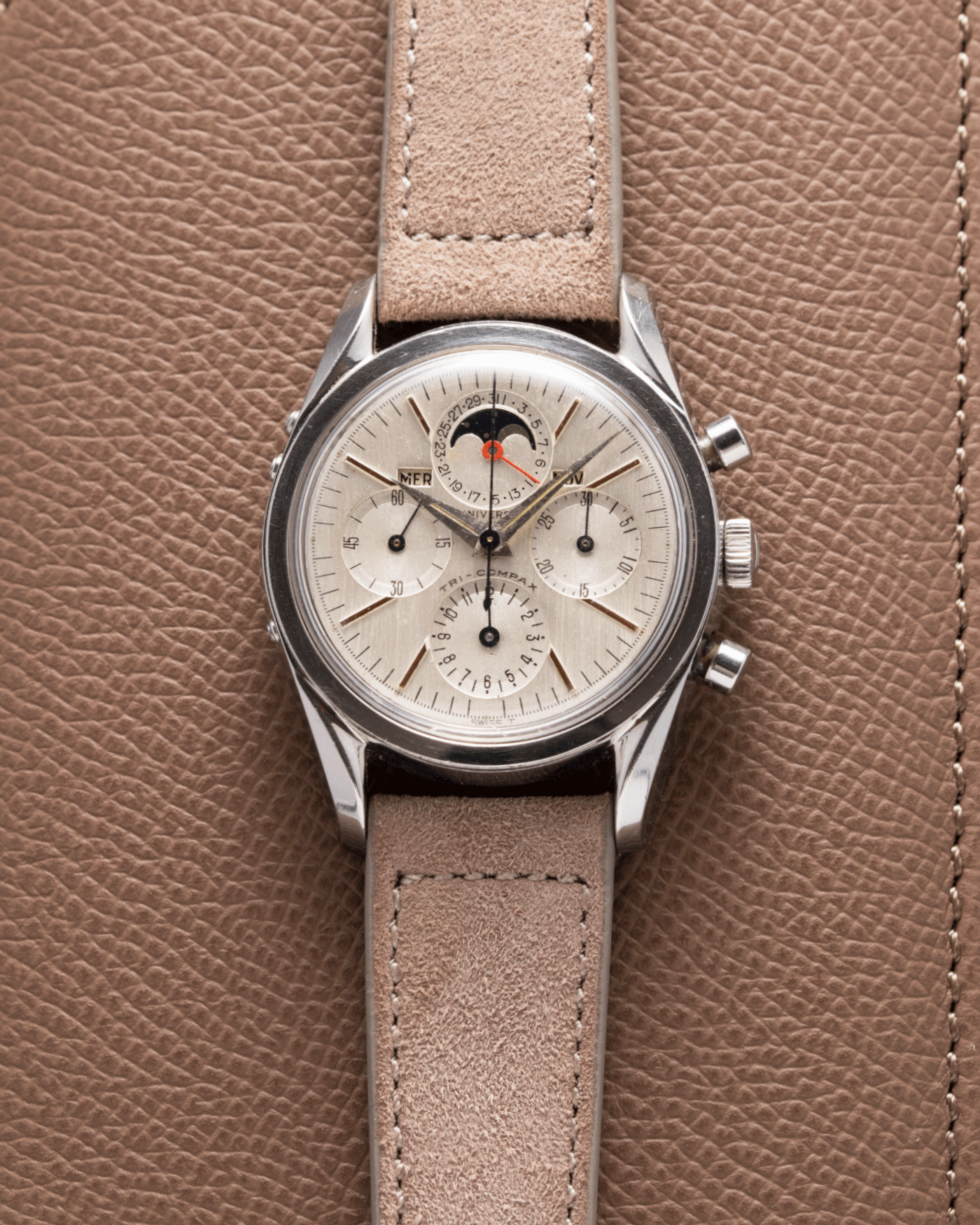 Brand: Universal Geneve Year: 1960’s Reference Number: 222100 Material: Stainless Steel Movement: Cal. 281 Case Diameter: 36mm Lug Width: 18mm Strap: Molequin Taupe Nubuck and Stainless Steel Buckle