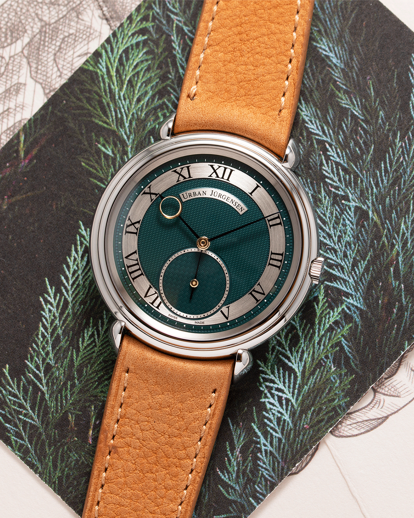 Brand: Urban Jurgensen Year: 2020 Model: Big 8 London Edition Material: Stainless Steel Movement: Frederic Piguet cal. 1160 Case Diameter: 40mm Strap: Chestnut Brown Suede Strap by A Collected Man and Stainless Steel Urban Jurgensen Tang Buckle