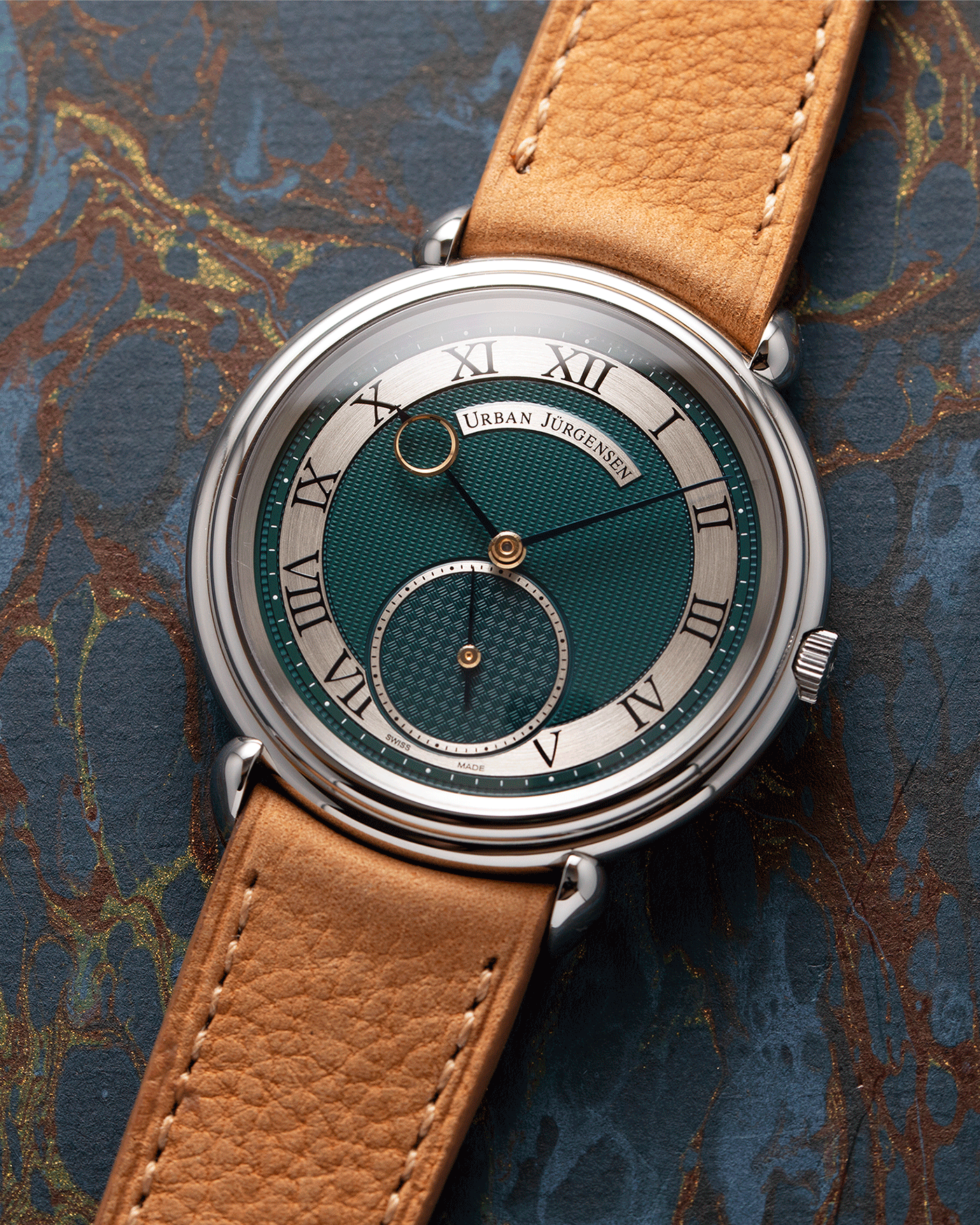 Brand: Urban Jurgensen Year: 2020 Model: Big 8 London Edition Material: Stainless Steel Movement: Frederic Piguet cal. 1160 Case Diameter: 40mm Strap: Chestnut Brown Suede Strap by A Collected Man and Stainless Steel Urban Jurgensen Tang Buckle