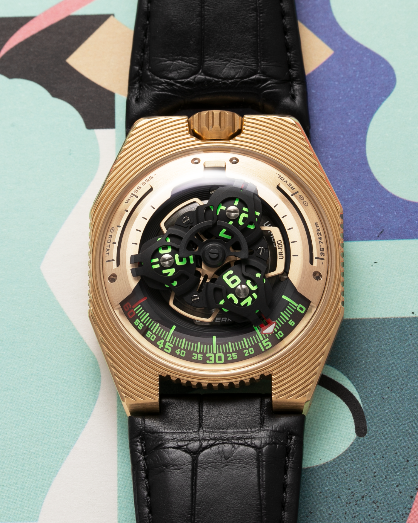 Brand: Urwerk Year: 2021 Model: UR100 Electrum Material: Electrum (Alloy of 20% Silver, Yellow Gold, Copper and Iron) Movement: Urwerk Cal. 12.01 Case Diameter: 41mm Bracelet/Strap: Urwerk Black Alligator Strap