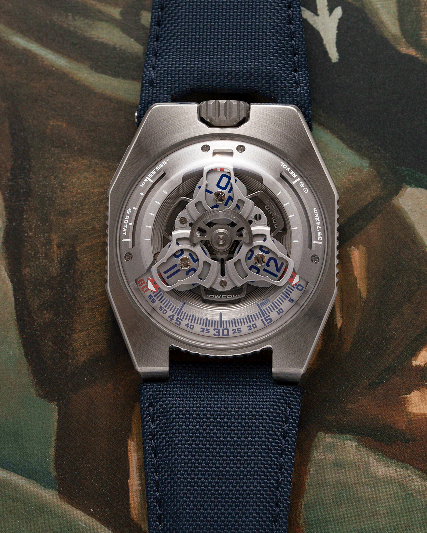 Brand: Urwerk Year: 2020 Model: UR100 Spacetime Material: Stainless Steel Movement: Urwerk Cal. 12.01 Case Diameter: 41mm Bracelet/Strap: Urwerk Blue Textile Strap