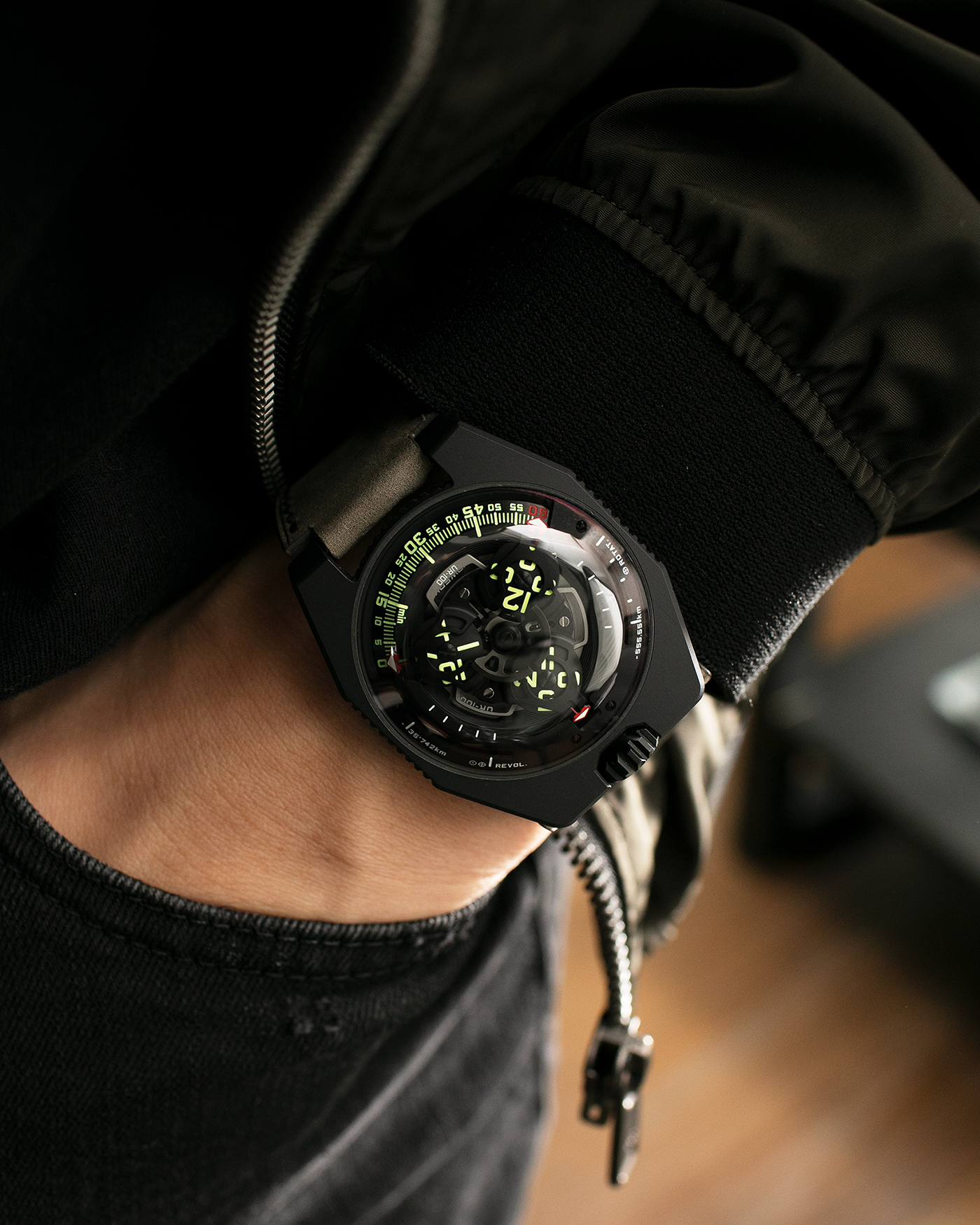 Brand: Urwerk Year: 2019 Model: UR100 Spacetime Black, Limited Edition of 25 pieces Material: Steel and Titanium, PVD Coated Movement: Urwerk Cal. 12.01, Self-Winding Case Dimensions: 41mm x 14mm Bracelet/Strap: Custom Moss Green Leather Strap with Signed Black DLC-Coated Titanium Tang Buckle, additional Urwerk Black Textile Strap 