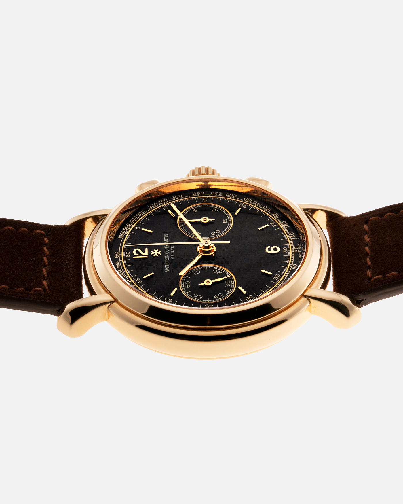 Brand: Vacheron Constantin Year: 2000's Model: Les Historiques Chronograph  Reference Number: 47101 Material: 18k Yellow Gold Movement: Lemania 2320 Based Cal. 1141 Case Diameter: 37mm Bracelet: Brown Suede with 18k Yellow Gold Tang Buckle
