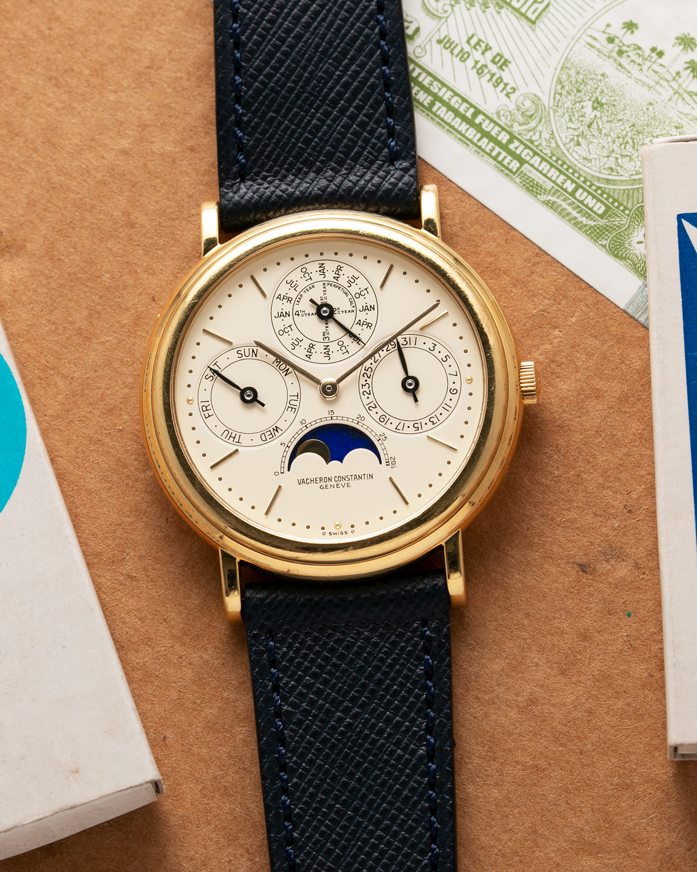 Brand: Vacheron Constantin Year: 1980’s / 1990’s Model: Perpetual Calendar Reference Number: 43031 Material: 18k Yellow Gold Movement: Vacheron Constantin Cal. 1120/2 Case Diameter: 36mm Bracelet: Molequin Navy Blue Texture Calf and Vacheron Constantin Brown Alligator with 18k Yellow Gold Tang Buckle