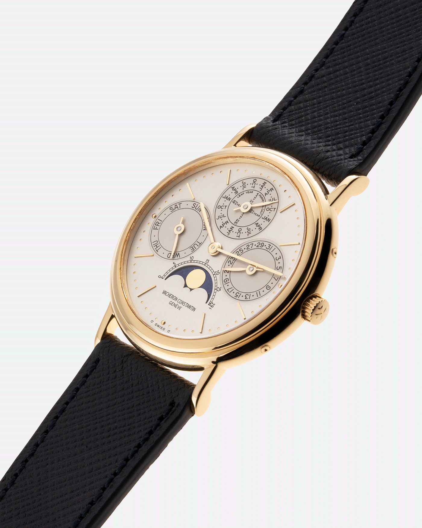 Brand: Vacheron Constantin Year: 1980’s Model: Perpetual Calendar Reference Number: 43031 Material: 18k Yellow Gold Movement: Vacheron Constantin Cal. 1120/2 Case Diameter: 36mm Bracelet: Molequin Navy Blue Texture Calf and Vacheron Constantin Brown Alligator with 18k Yellow Gold Tang Buckle