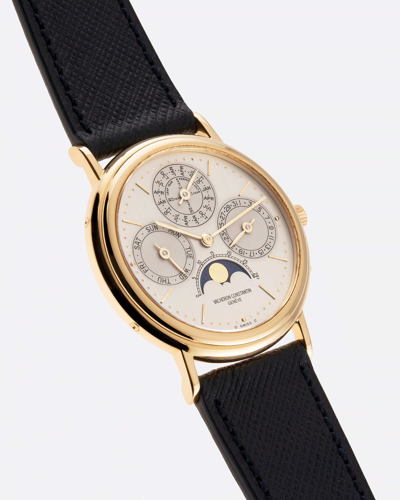 Brand: Vacheron Constantin Year: 1980’s Model: Perpetual Calendar Reference Number: 43031 Material: 18k Yellow Gold Movement: Vacheron Constantin Cal. 1120/2 Case Diameter: 36mm Bracelet: Molequin Navy Blue Texture Calf and Vacheron Constantin Brown Alligator with 18k Yellow Gold Tang Buckle