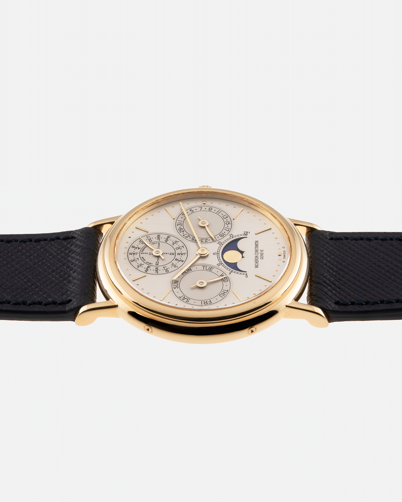 Brand: Vacheron Constantin Year: 1980’s Model: Perpetual Calendar Reference Number: 43031 Material: 18k Yellow Gold Movement: Vacheron Constantin Cal. 1120/2 Case Diameter: 36mm Bracelet: Molequin Navy Blue Texture Calf and Vacheron Constantin Brown Alligator with 18k Yellow Gold Tang Buckle
