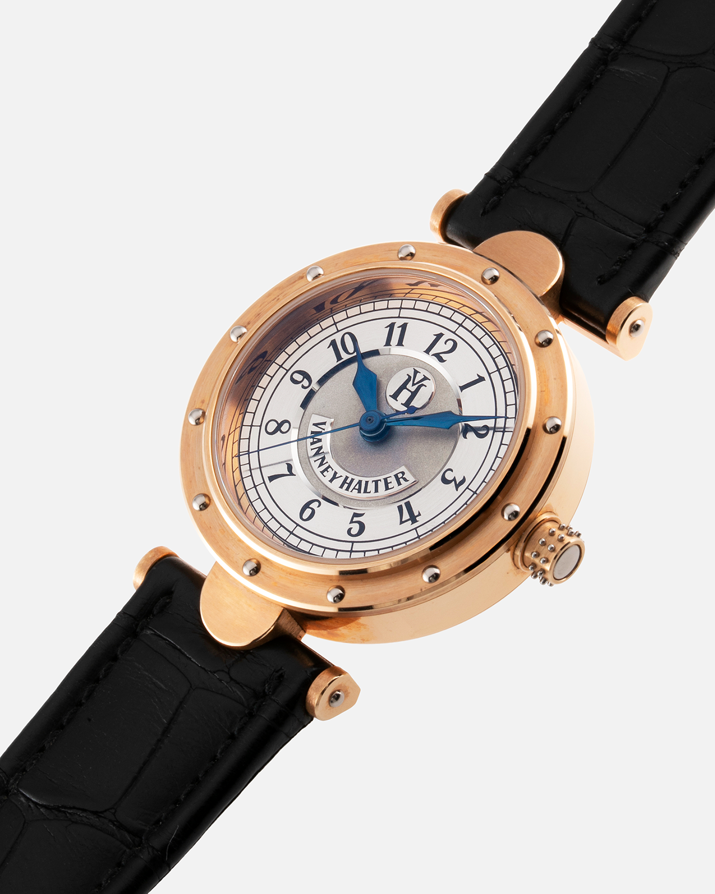 Brand: Vianney Halter Year: 2000’s Model: Classic Material: 18k Rose Gold Movement: Modified Lemania 8810 with mystery motor Case Diameter: 36mm Bracelet/Strap: Vianney Halter Black Alligator with matching Rose Gold Buckle