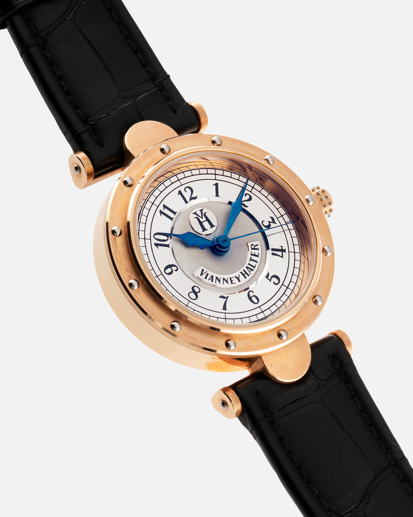 Brand: Vianney Halter Year: 2000’s Model: Classic Material: 18k Rose Gold Movement: Modified Lemania 8810 with mystery motor Case Diameter: 36mm Bracelet/Strap: Vianney Halter Black Alligator with matching Rose Gold Buckle