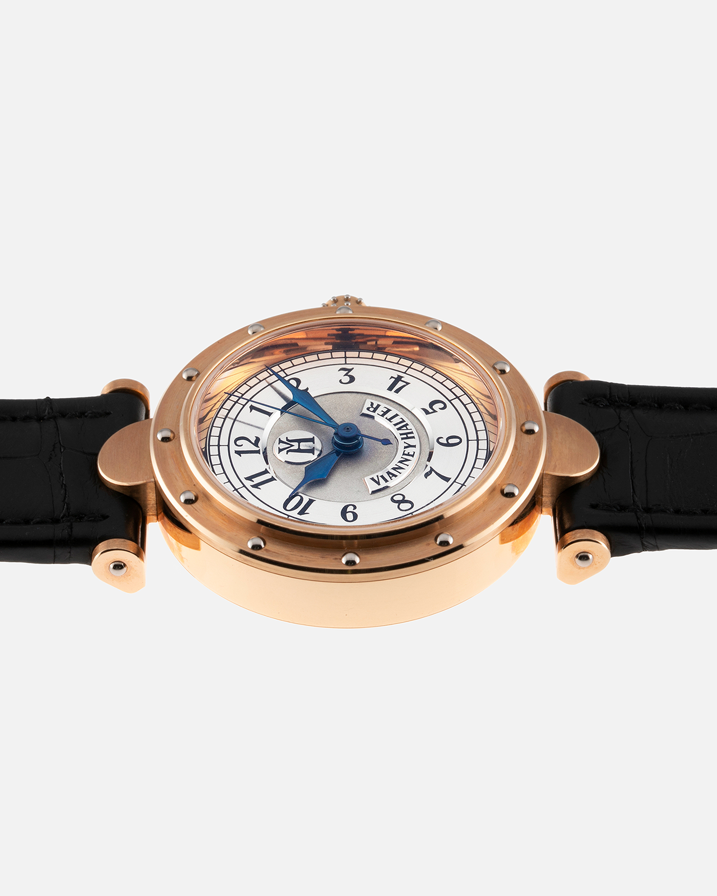 Brand: Vianney Halter Year: 2000’s Model: Classic Material: 18k Rose Gold Movement: Modified Lemania 8810 with mystery motor Case Diameter: 36mm Bracelet/Strap: Vianney Halter Black Alligator with matching Rose Gold Buckle