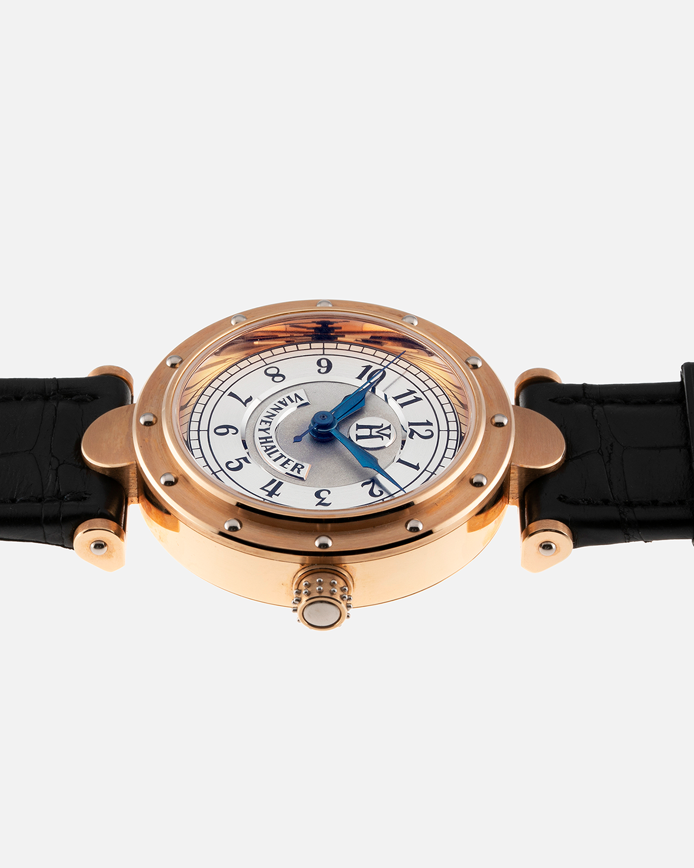 Brand: Vianney Halter Year: 2000’s Model: Classic Material: 18k Rose Gold Movement: Modified Lemania 8810 with mystery motor Case Diameter: 36mm Bracelet/Strap: Vianney Halter Black Alligator with matching Rose Gold Buckle