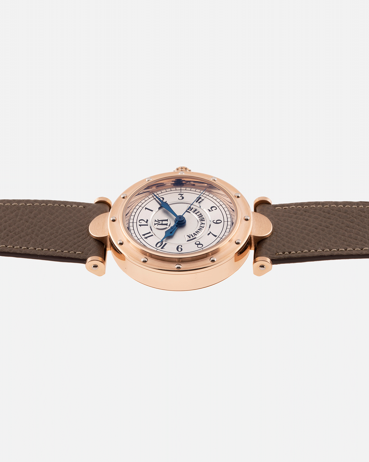 Brand: Vianney Halter Year: 2000’s Model: Classic Material: 18k Rose Movement: Modified Lemania 8810 with mystery motor Case Diameter: 36mm Bracelet/Strap: Vianney Halter Black Alligator with matching Yellow Gold Buckle