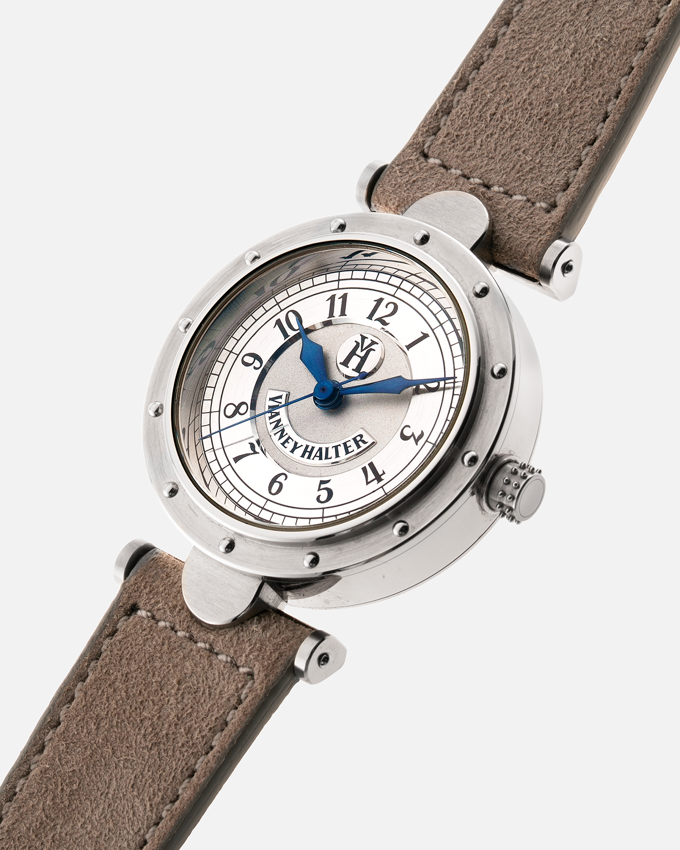Brand: Vianney Halter Year: 2000’s Model: Classic Material: 18k White Gold Movement: Modified Lemania 8810 with mystery motor Case Diameter: 36mm Bracelet/Strap: Molequin Taupe Suede with 18k White Gold Tang Buckle 