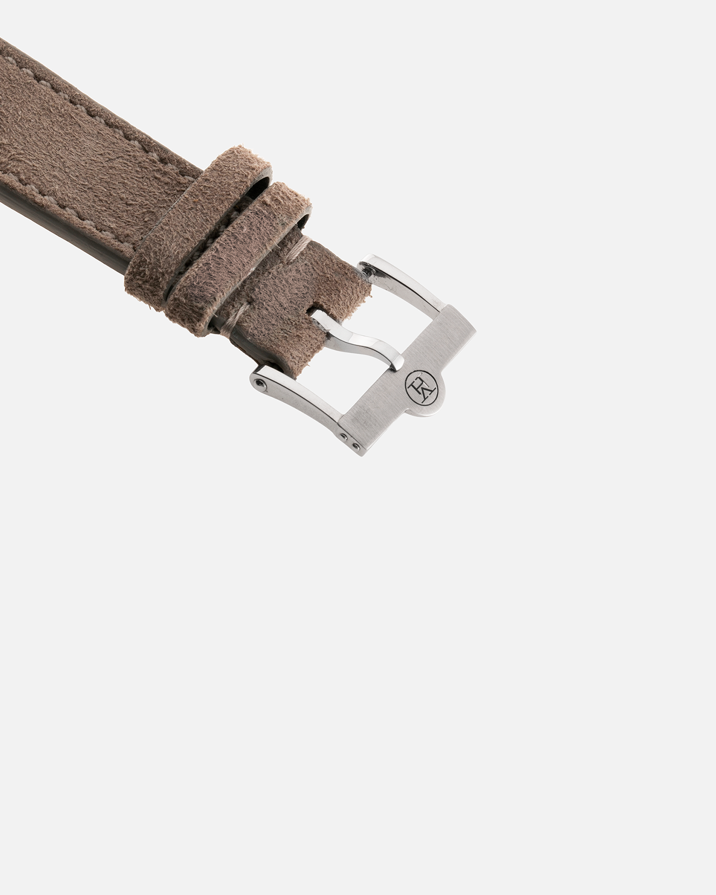 Brand: Vianney Halter Year: 2000’s Model: Classic Material: 18k White Gold Movement: Modified Lemania 8810 with mystery motor Case Diameter: 36mm Bracelet/Strap: Molequin Taupe Suede with 18k White Gold Tang Buckle 