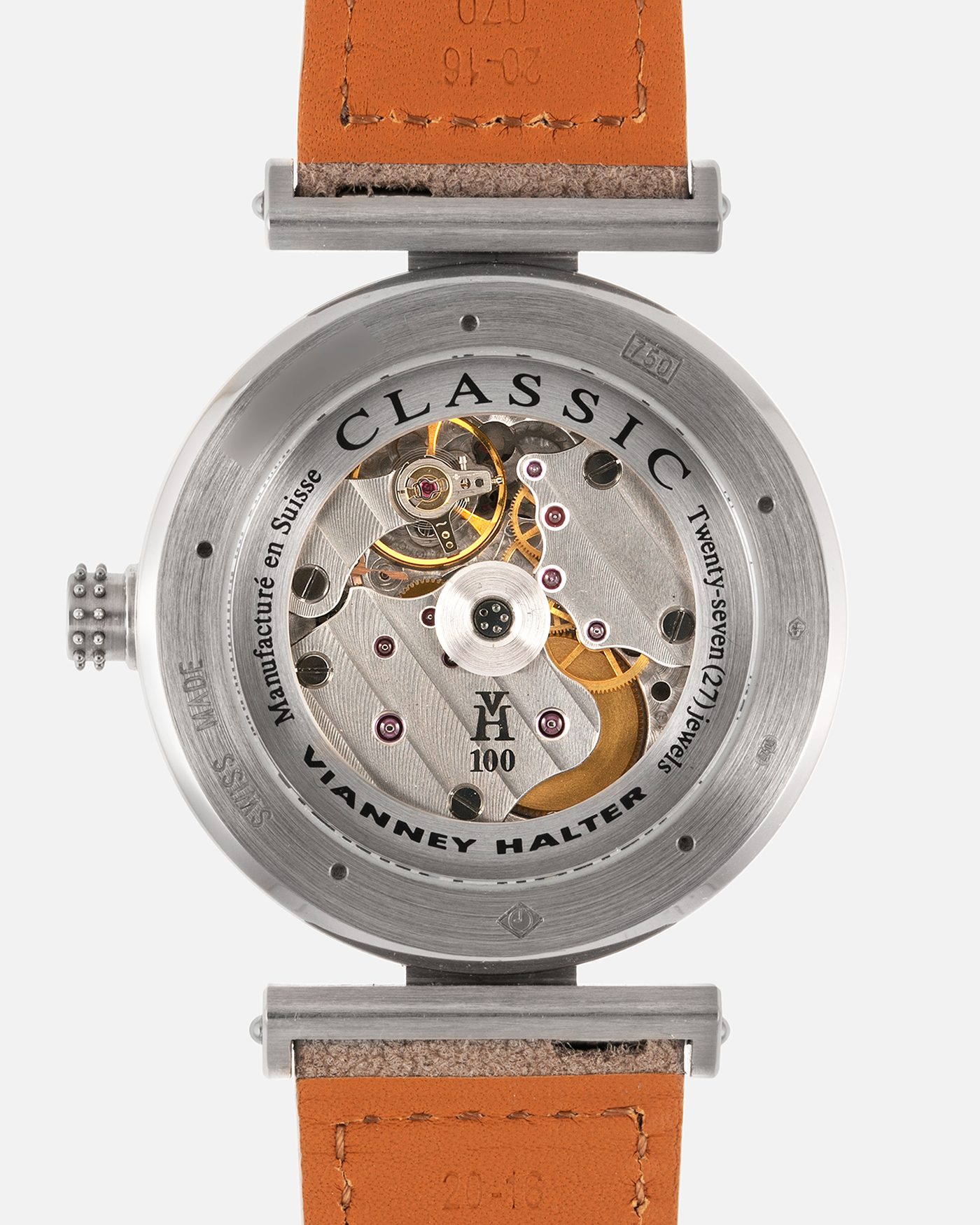 Brand: Vianney Halter Year: 2000’s Model: Classic Material: 18k White Gold Movement: Modified Lemania 8810 with mystery motor Case Diameter: 36mm Bracelet/Strap: Molequin Taupe Suede with 18k White Gold Tang Buckle 