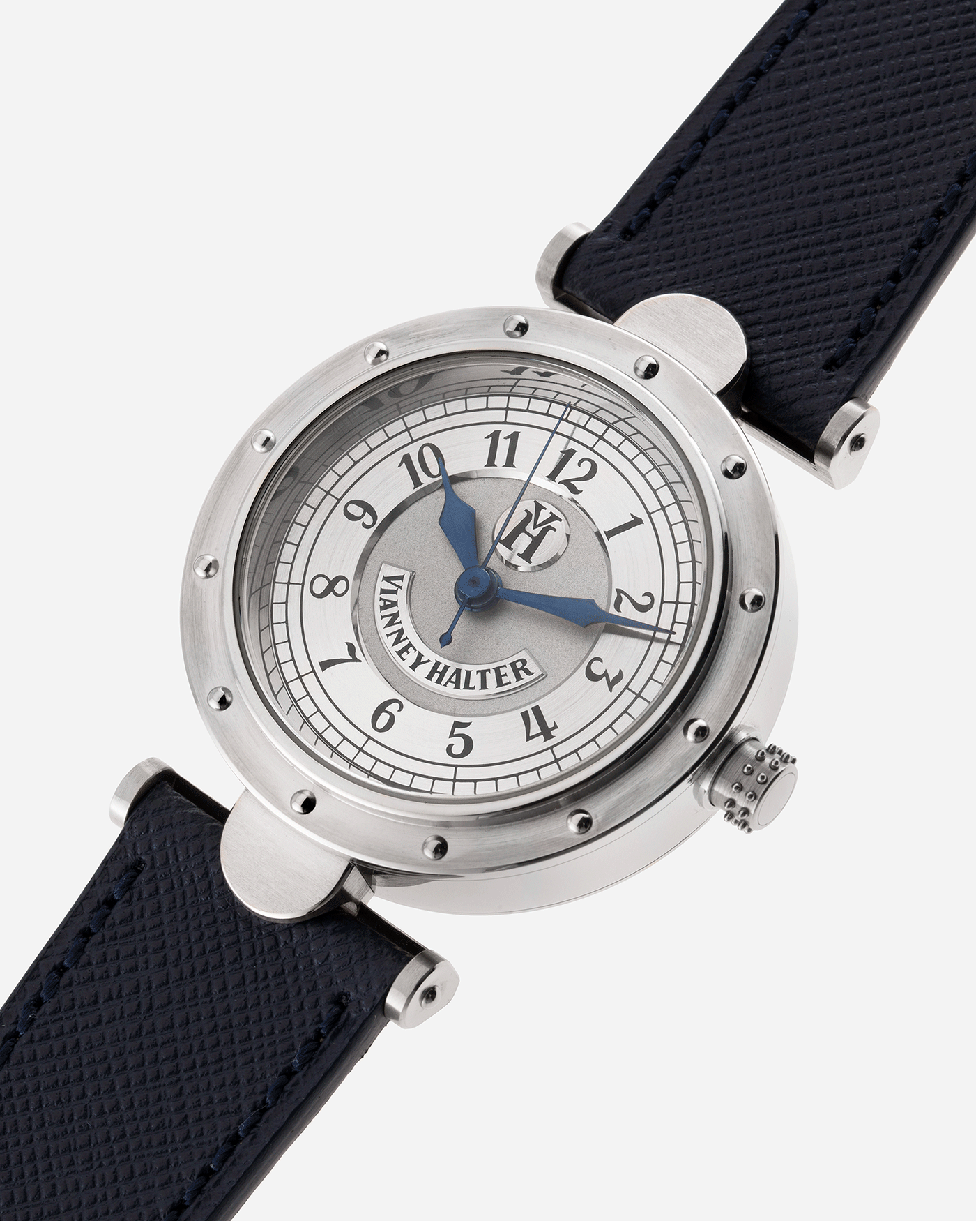 Brand: Vianney Halter Year: 2000’s Model: Classic Material: 18k White Gold Movement: Modified Lemania 8810 with mystery motor Case Diameter: 36mm Bracelet/Strap: Vianney Halter Black Alligator with matching White Gold Buckle and Navy Blue Molequin Textured Calf