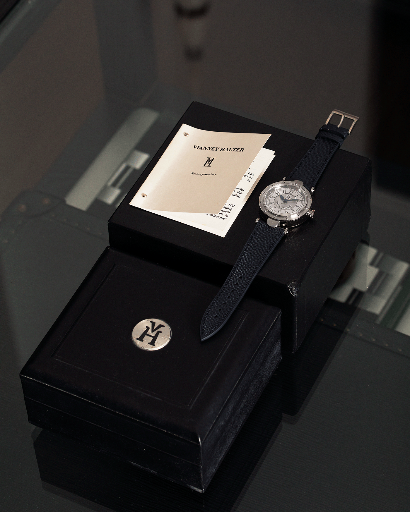 Brand: Vianney Halter Year: 2000’s Model: Classic Material: 18k White Gold Movement: Modified Lemania 8810 with mystery motor Case Diameter: 36mm Bracelet/Strap: Vianney Halter Black Alligator with matching White Gold Buckle and Navy Blue Molequin Textured Calf