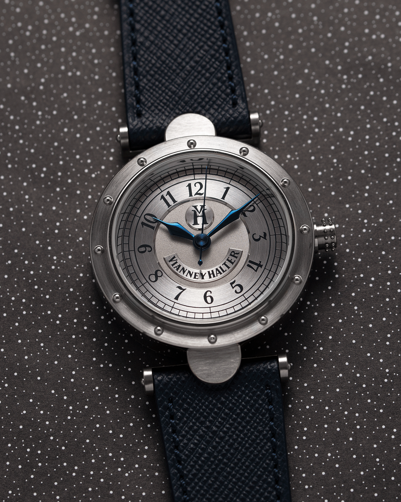 Brand: Vianney Halter Year: 2000’s Model: Classic Material: 18k White Gold Movement: Modified Lemania 8810 with mystery motor Case Diameter: 36mm Bracelet/Strap: Vianney Halter Black Alligator with matching White Gold Buckle and Navy Blue Molequin Textured Calf
