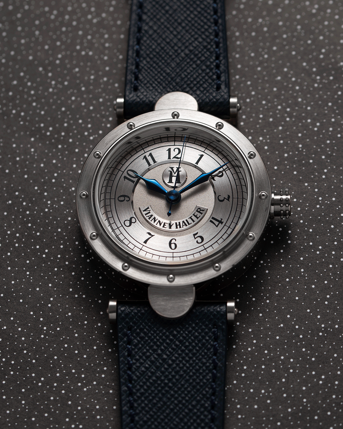 Brand: Vianney Halter Year: 2000’s Model: Classic Material: 18k White Gold Movement: Modified Lemania 8810 with mystery motor Case Diameter: 36mm Bracelet/Strap: Vianney Halter Black Alligator with matching White Gold Buckle and Navy Blue Molequin Textured Calf