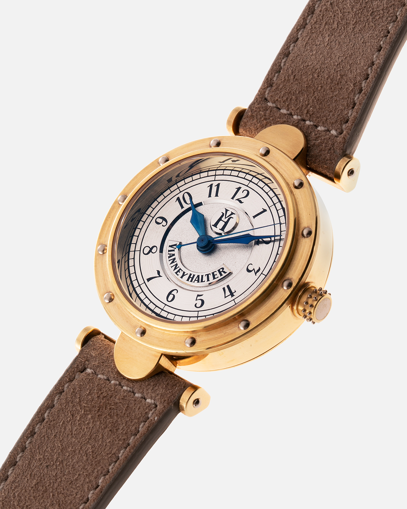 Brand: Vianney Halter Year: 2000’s Model: Classic Material: 18k Yellow Gold Movement: Modified Lemania 8810 with mystery motor Case Diameter: 36mm Bracelet/Strap: Molequin Beige Suede with matching Yellow Gold Buckle