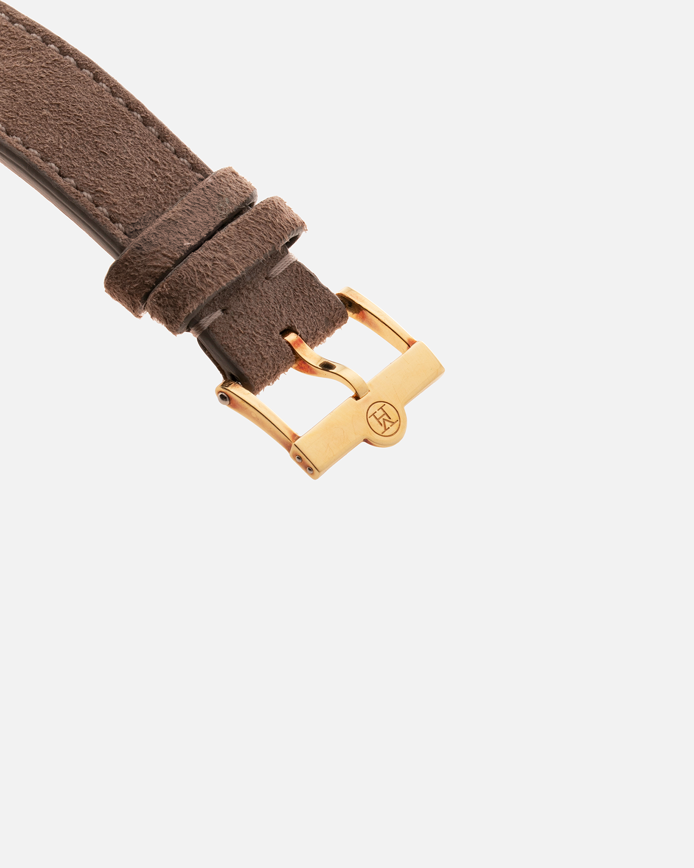 Brand: Vianney Halter Year: 2000’s Model: Classic Material: 18k Yellow Gold Movement: Modified Lemania 8810 with mystery motor Case Diameter: 36mm Bracelet/Strap: Molequin Beige Suede with matching Yellow Gold Buckle