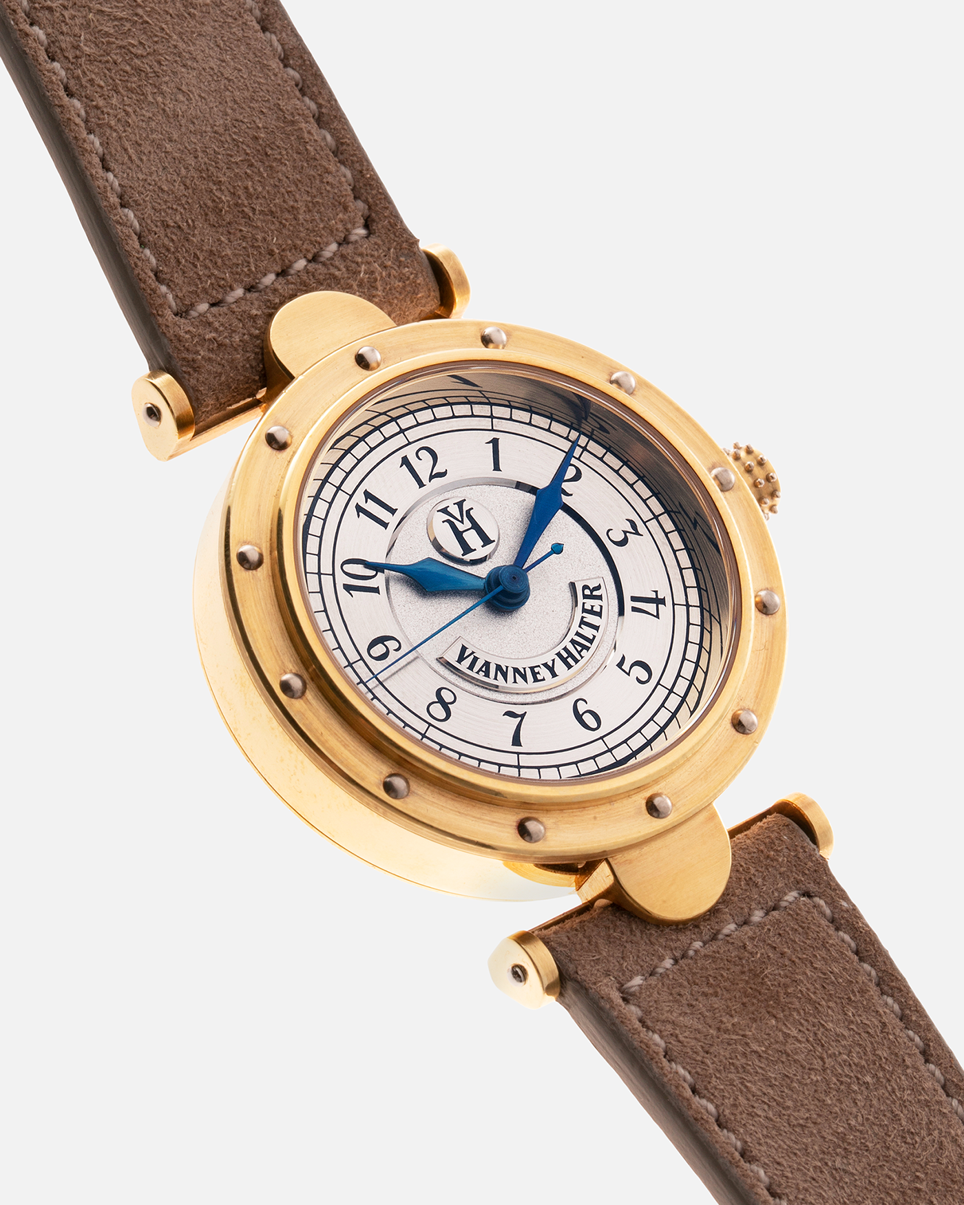 Brand: Vianney Halter Year: 2000’s Model: Classic Material: 18k Yellow Gold Movement: Modified Lemania 8810 with mystery motor Case Diameter: 36mm Bracelet/Strap: Molequin Beige Suede with matching Yellow Gold Buckle