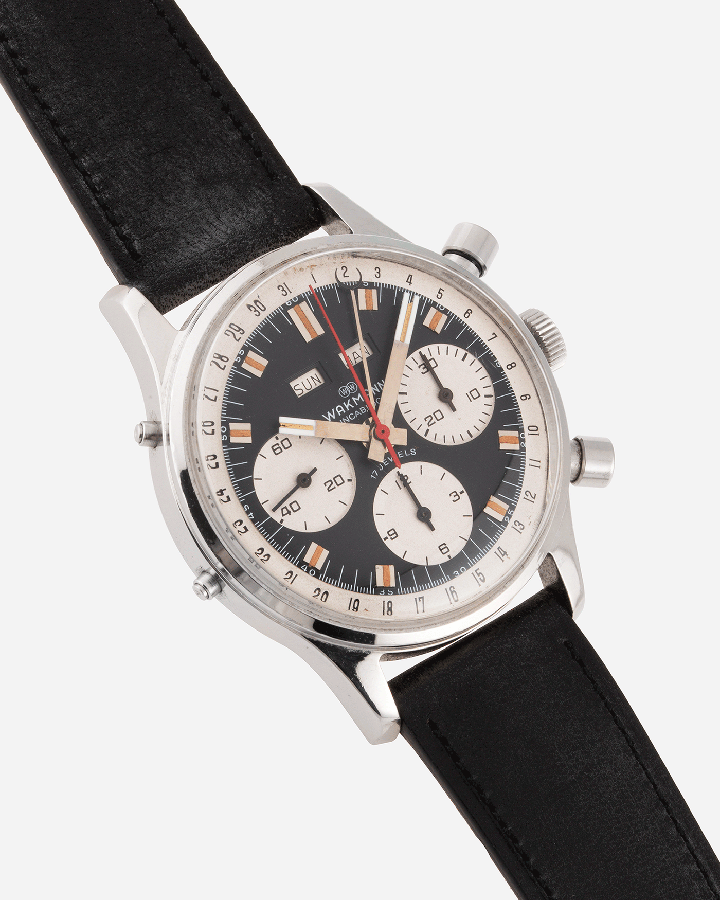 Brand: Wakmann Year: 1970’s Model: Triple Calendar Chronograph Serial Number: 71.1309.70 Material: Stainless Steel Movement: Valjoux 723 Case Diameter: 39mm Lug Width: 20mm Bracelet/Strap: Nostime Black Calf