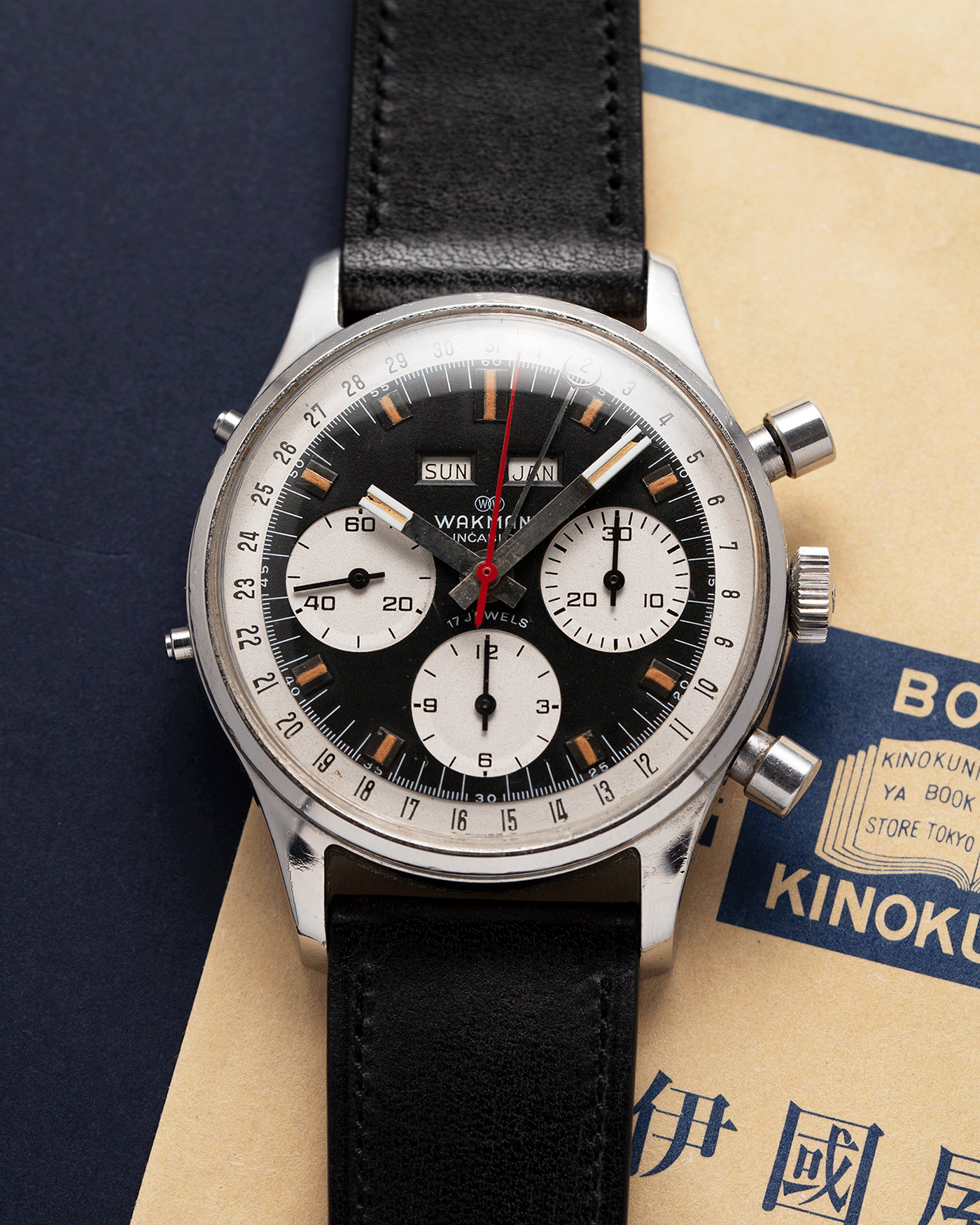 Brand: Wakmann Year: 1970’s Model: Triple Calendar Chronograph Serial Number: 71.1309.70 Material: Stainless Steel Movement: Valjoux 723 Case Diameter: 39mm Lug Width: 20mm Bracelet/Strap: Nostime Black Calf